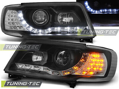 HEADLIGHTS DAYLIGHT BLACK fits 100 C4 12.90-06.94