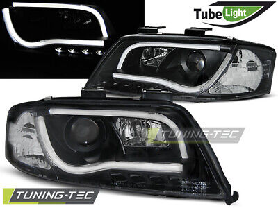 HEADLIGHTS TUBE LIGHT BLACK fits A6 06.01-05.04