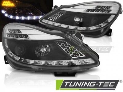 Coppia Fari Fanali Anteriori Tuning CORSA D 2006 > 2011 DAYLIGHT Neri frecc