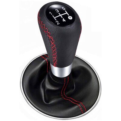 <ul> <li>Pomello Cambio Universale in Pelle con Emblemi Intercambiabili:</li>