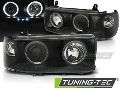 Coppia Fari Fanali Anteriori Tuning LAND CRUISER FJ 80 90-97 NERO H1+H1