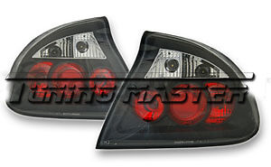 coppia set Fari fanali tuning posteriori Tigra 95>00 Trasparenti Neri