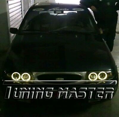 Coppia Fari Fanali Anteriori Fiesta MK4 JA/JB Tuning Angel Eyes 99-02 Neri